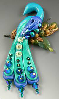 Clay peacock with glass beads